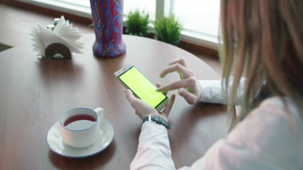 One Young Business Woman Working in Cafe with Phone Green Screen