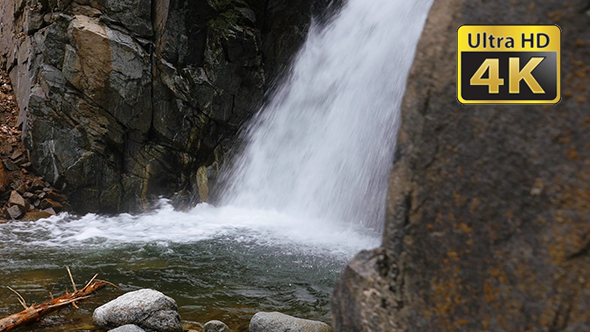 Waterfall And River In The Forest