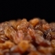 Raisin Rotates on a Black Background - VideoHive Item for Sale