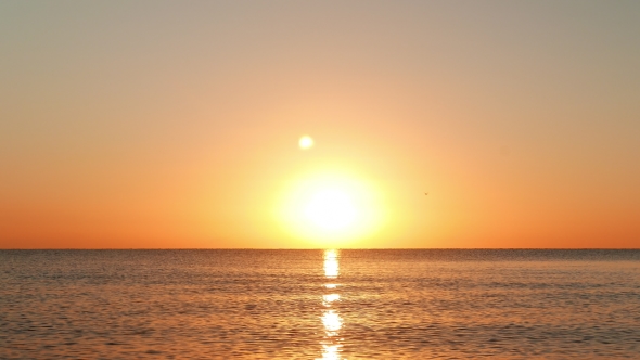 Sun Rising on the Golden Colored Sky alt