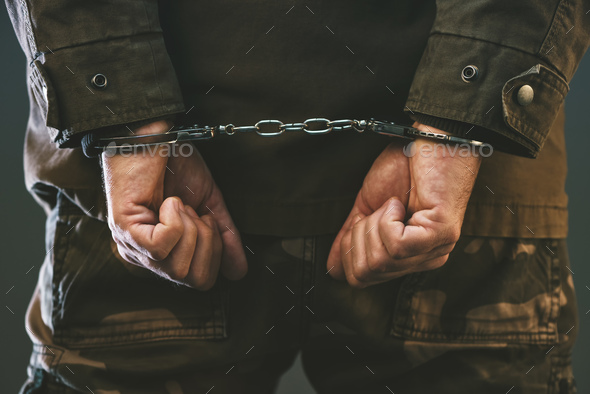 Handcuffed soldier - Stock Photo - Images