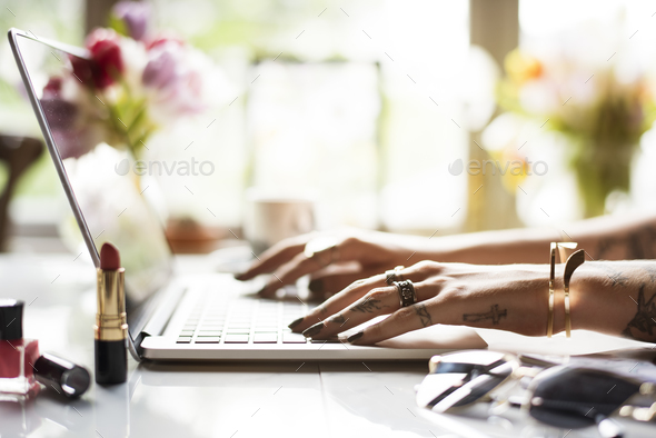 Woman Using Laptop Surfing Online Shop - Stock Photo - Images