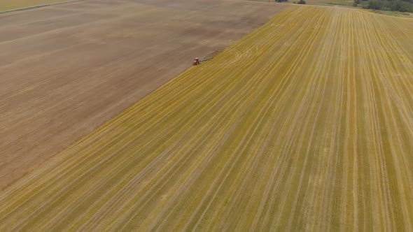 Tractor Working on the Prairie alt