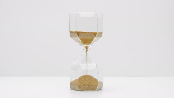 Closeup of a Sand Clock in the Middle of the Frame