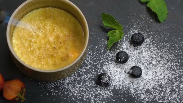 Dessert in a Round Shape Caramelized with a Burner alt