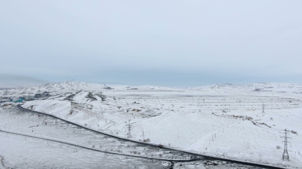 Aerial View of Ore Storage Producing Copper in Winter. Large Industrial Area From Above.