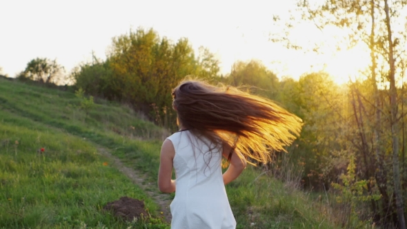 Girl Runs Along the Path