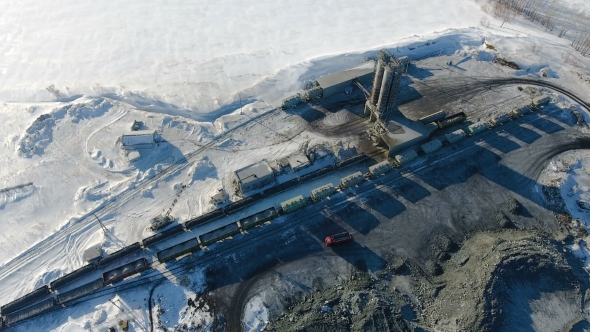 Aerial View of Ore Storage Producing Copper in Winter. Large Industrial Area From Above.