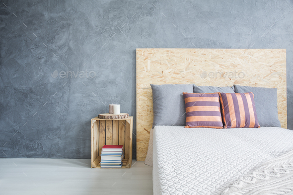 Bedroom with diy, wood bed - Stock Photo - Images