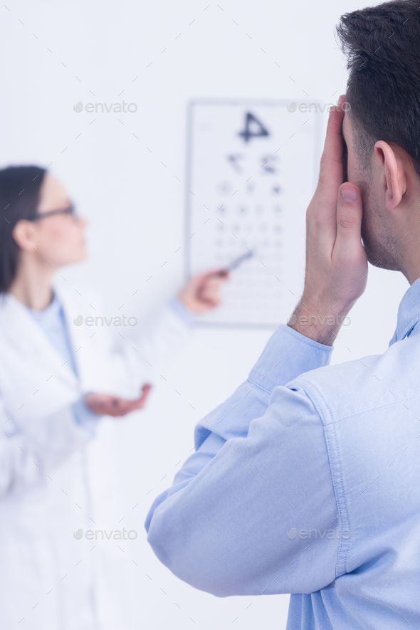 Man having eye sight test - Stock Photo - Images