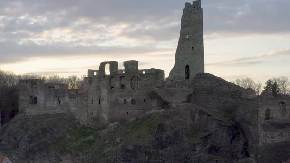Ruins of medieval castle Okoř in Czechia against evening autumn sky. alt
