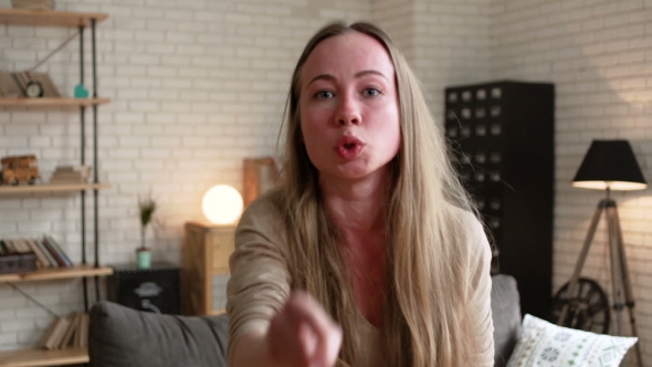 POV View at Young Blonde Enraged Woman Shouting with Anger and Crying