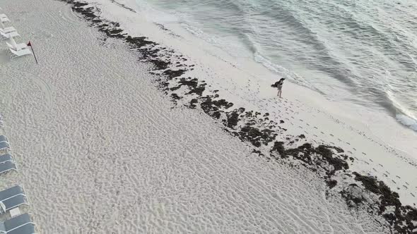 footage model walking on the beach alt