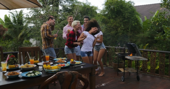 Young People Dancing While Cooking Barbecue Happy Group Cheerful Gathering On Summer Terrace Having