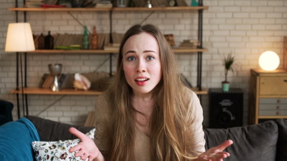 Young Exited Woman Speaks Emotionally and Blab Actively Without Stopping alt