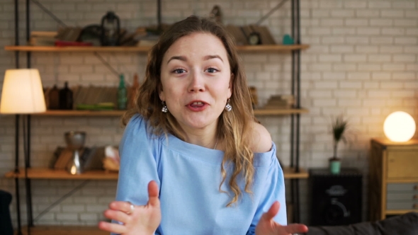 Young Exited Woman Speaks Emotionally and Blab Actively Without Stopping alt