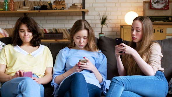 Three Young Girl Have Addiction of Telephone Mobile and Online Life