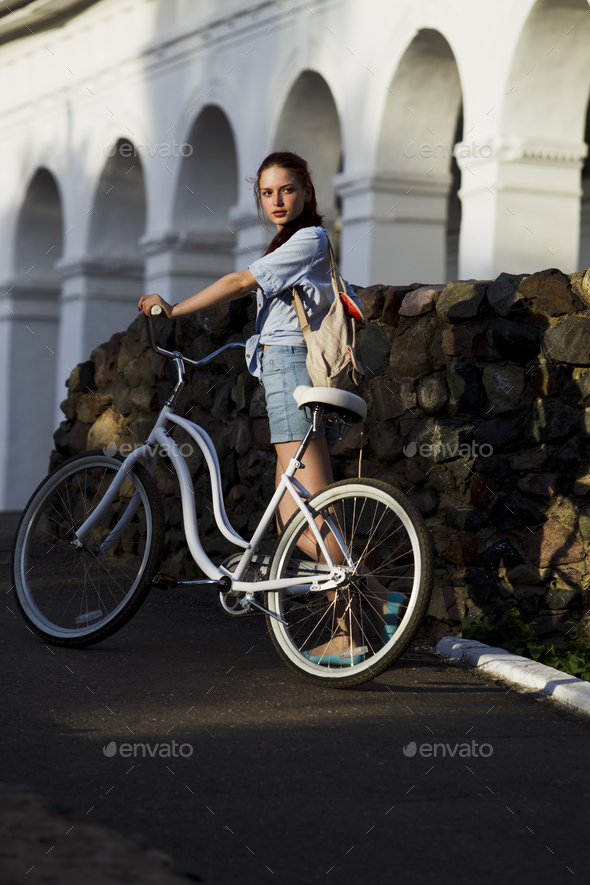 Girl and white bike - Stock Photo - Images
