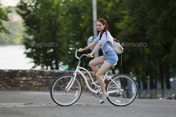 Girl and white bike - Stock Photo - Images
