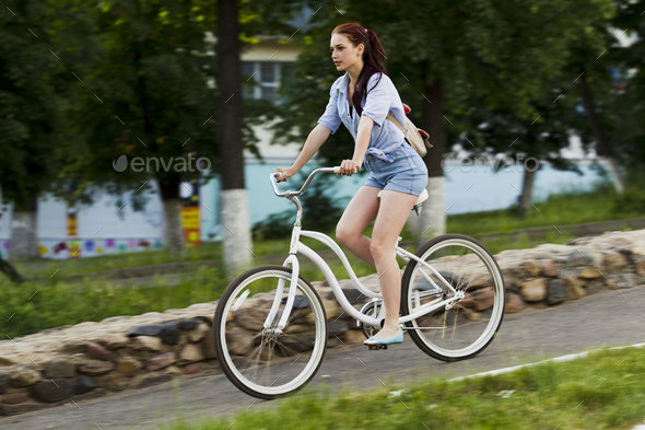 Girl and white bike - Stock Photo - Images