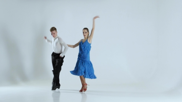 Couple of Graceful Dancers Perform Latino on White Background, Shadow alt