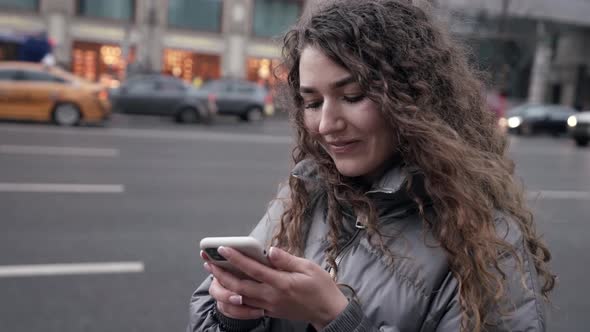Townswoman Is Using App in Smartphone on Street Checking Map and Timetable of Buses Reading Messages alt