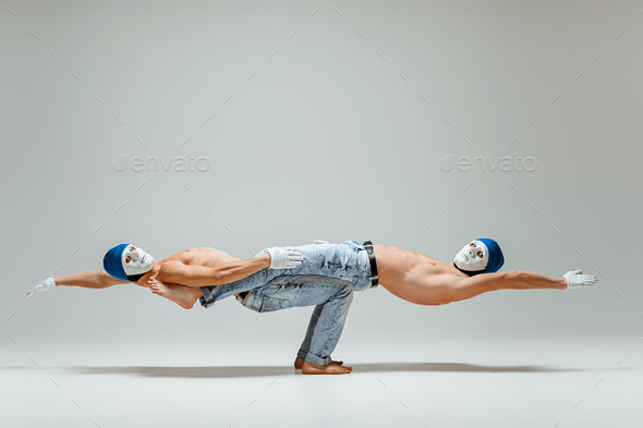 The two gymnastic acrobatic caucasian men on balance pose