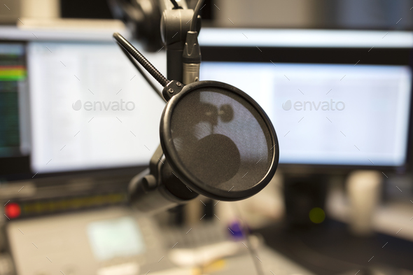 Close-up of a microphone in radio station broadcasting studio - Stock Photo - Images