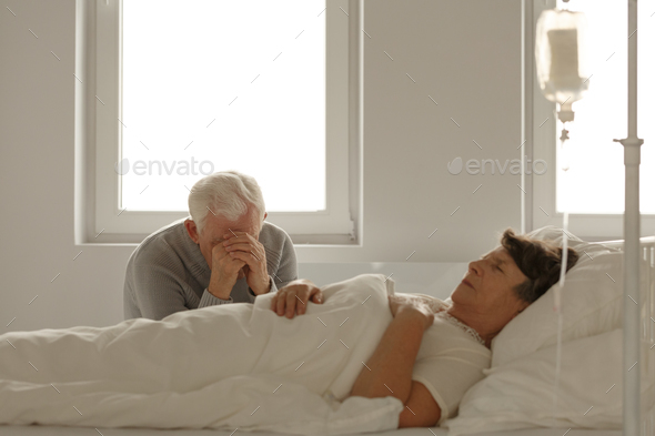 Despair husband and dying wife - Stock Photo - Images