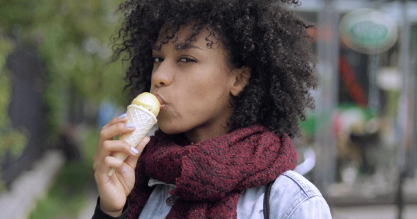 African Woman Eating Ice Cream Stock Footage Videohive