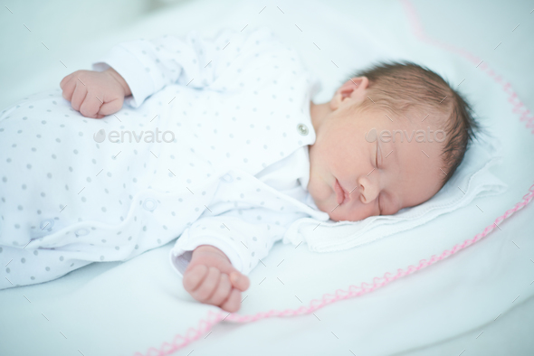 Adorable Child Sleeping on White Blanket Stock Photo by Daniel_Dash