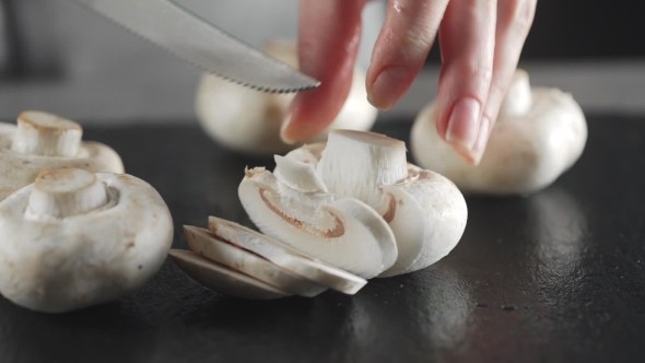 VideoHive Housewife Is Slicing Shampignon Salad with Mushrooms Vegetarian Food 19978222 VideoHive Housewife Is Slicing Shampignon Salad with Mushrooms Vegetarian Food 19978222