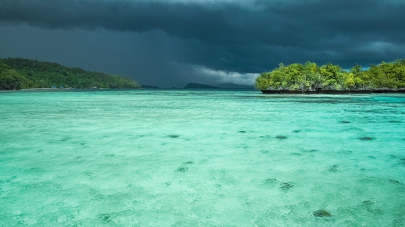 Beautiful Blue Lagoon with Pure Clear Water Shortly Before Thunderstorm Begining, Gam Island, West alt