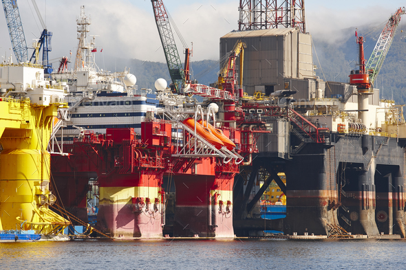 Oil and gas platform in Norway. Energy industry. Petroleum exploration Stock Photo by ABBPhoto