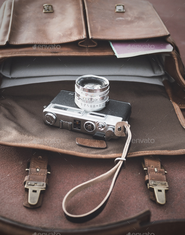 Leather Bag and Film Camera - Stock Photo - Images