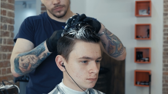 VideoHive Handsome Man Gets a Haircut in the Salon Toning Hair in Blue 19995843 VideoHive Handsome Man Gets a Haircut in the Salon Toning Hair in Blue 19995843