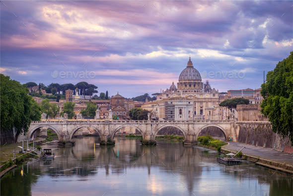 Scenic view of colorful sunrise over St Peters basilica in Rome - Stock Photo - Images