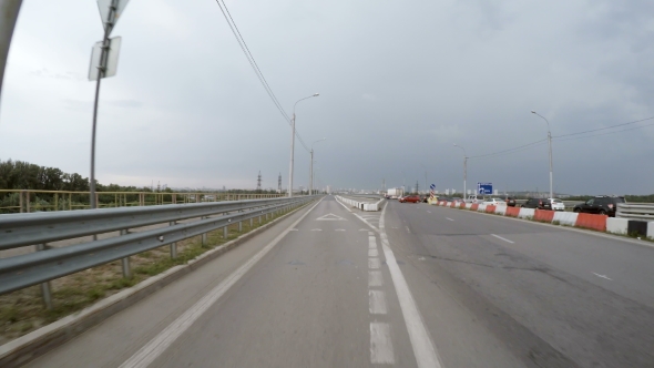 Car Is Driving Along the Highway