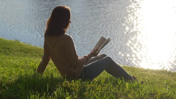 Girl Reading By the Lake