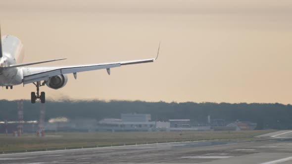 Airplane Landing at the Early Morning alt