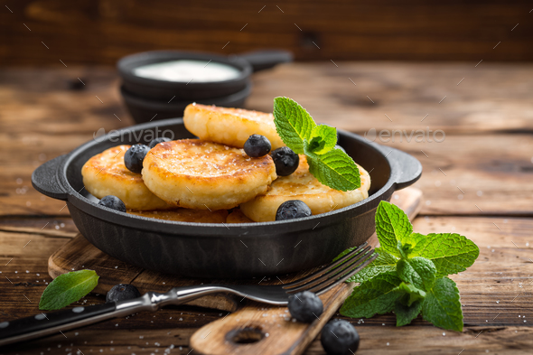 Delicious Cottage Cheese Pancakes Or Syrniki With Fresh Blueberry