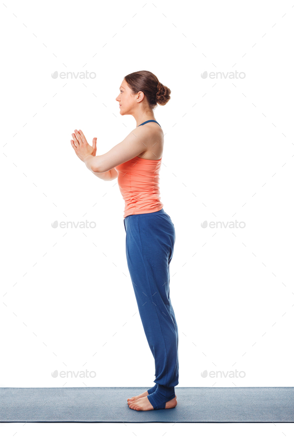 Premium Photo | Class standing in namaste pose at yoga class