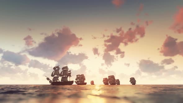 Historical ships sailing at sunset. alt