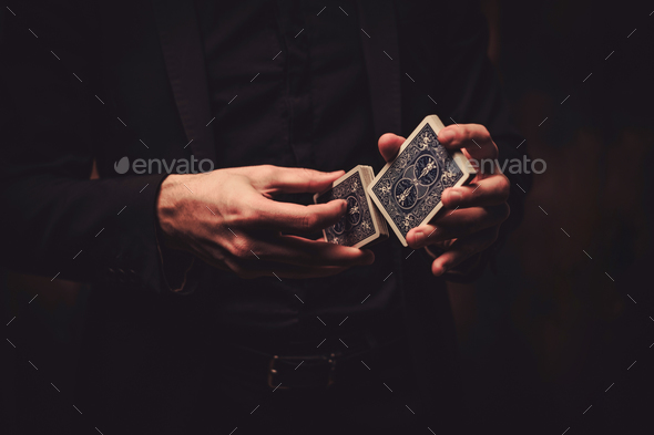Man showing tricks with cards - Stock Photo - Images