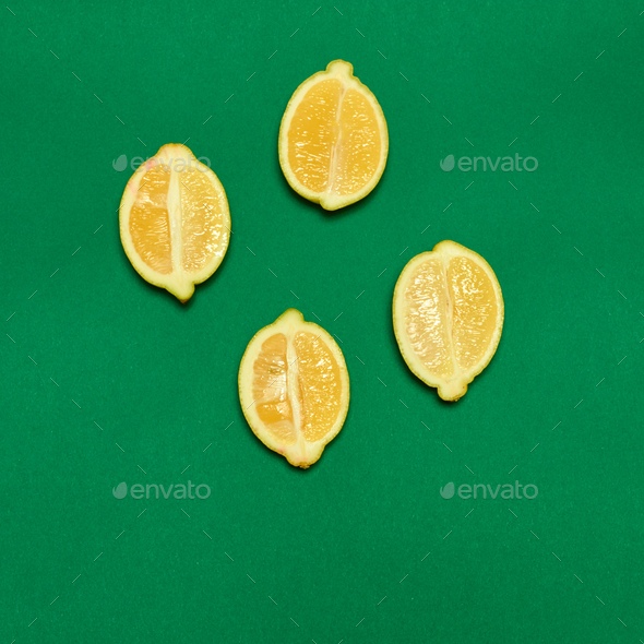 Lemons on green background - Stock Photo - Images