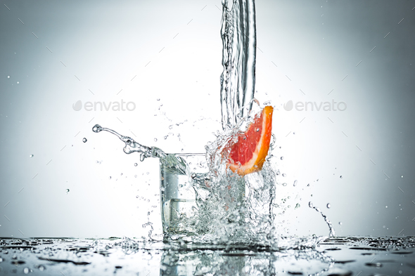 water splash in glass of gray color - Stock Photo - Images