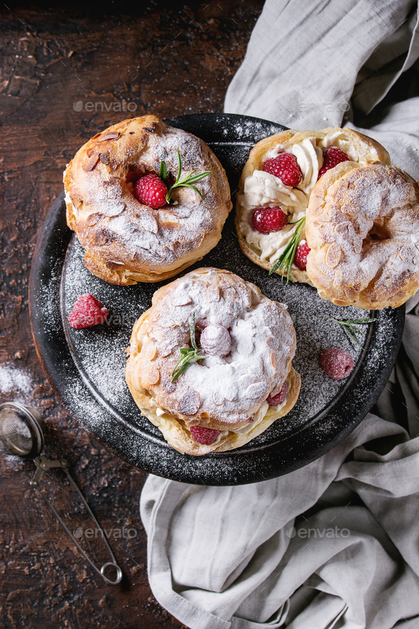 Choux cake Paris Brest with raspberries - Stock Photo - Images