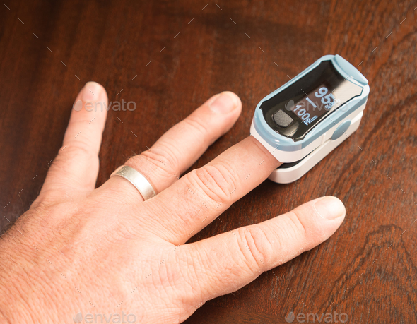 Fingertip Oxygen Sensor Pulse Rate Health Testor Oximeter - Stock Photo - Images