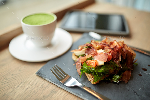 ham salad with matcha green tea at restaurant - Stock Photo - Images