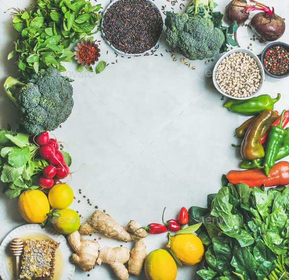 Clean eating healthy cooking ingredients over grey marble background - Stock Photo - Images